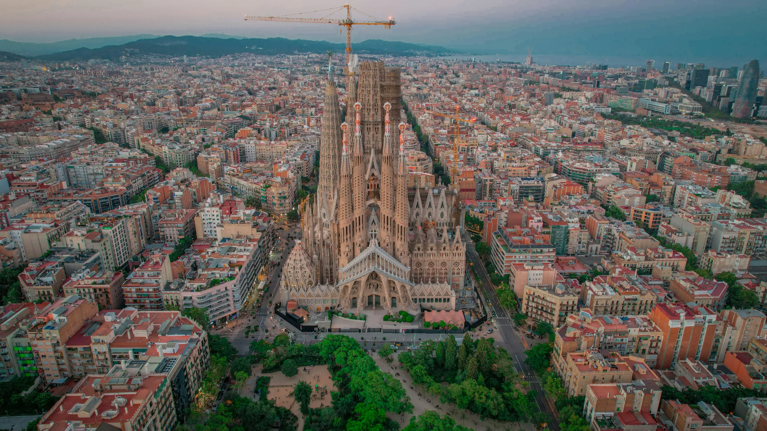 Aerial view of the Sagrada Familia in the heart of Barcelona at sunset