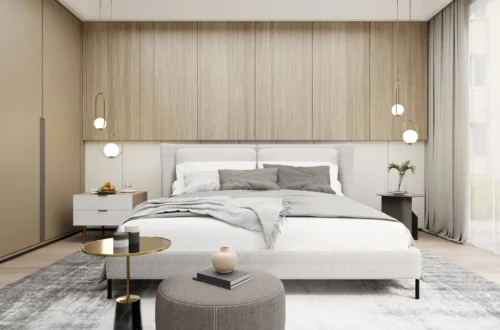 Dormitorio moderno y elegante con cama de diseño, cabecero de madera, iluminación colgante y decoración minimalista en tonos neutros que aporta sensación de confort y sofisticación